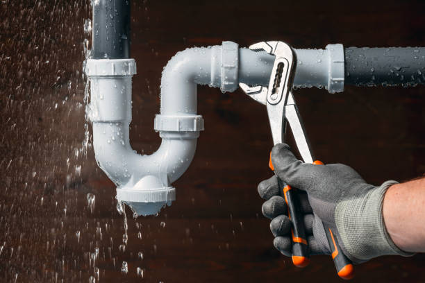 Professional Drain Cleaning technician working in Helenville, WI